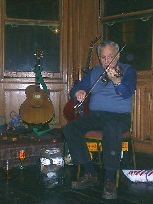 Tom trying out a new fiddle